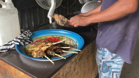 Process of making Ikan Bakar (Grilled Fish) Stock Footage 214594567