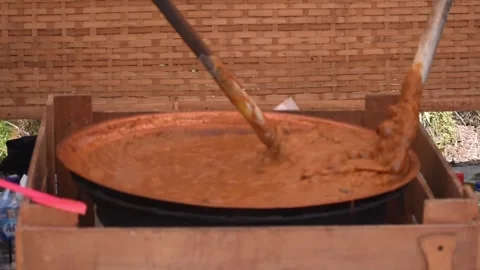 The process of making Jenang or durian dodol Stock Footage 327858887