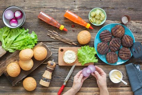 Process of making a juicy burger Fotos de archivo