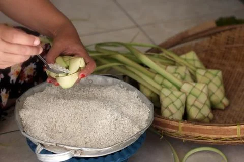 The process of making ketupat.  Stock Photos