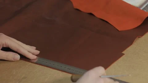 The process of making a key holder from leather. Marking and cutting Stock Footage 169285702