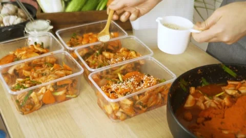 Process of making kimchi. Close up of a pair of hands folding cabbage kimch.. Stock Footage 272465489