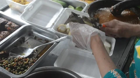 The process of making Kupat Tahu typical of Indonesian traditional food Stock Footage 221888919