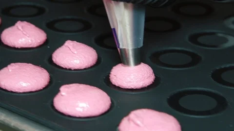 Process Of Making Macaron, French Dessert, Squeezing The Dough Form Cooking Bag Stock Footage 93020544