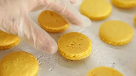 Process of making macaron macaroon, french dessert, squeezing the dough form Video stock 129917505