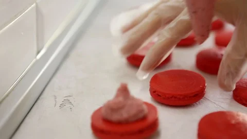 Process of making macaron macaroon, french dessert, squeezing the dough form Stock Footage 129917631