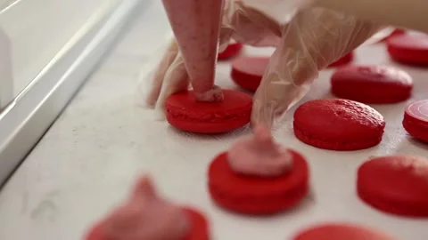 Process of making macaron macaroon, french dessert, squeezing the dough form Video stock 130238177