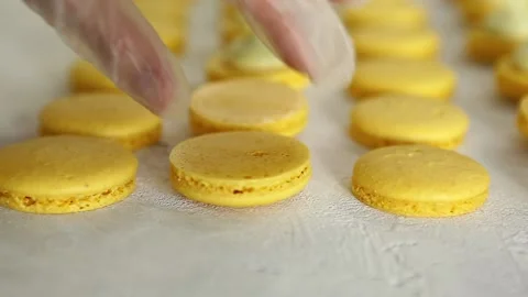 Process of making macaron macaroon, french dessert, squeezing the dough form Stock Footage 130673273