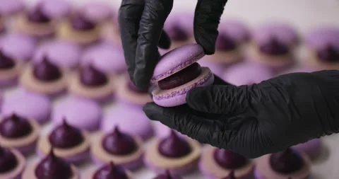 Process of making macaron macaroon, french dessert. Assembly of two halves with Video stock 148645316