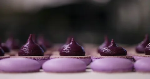 Process of making macaron macaroon, french dessert, squeezing the dough form Vídeos de archivo 148786176