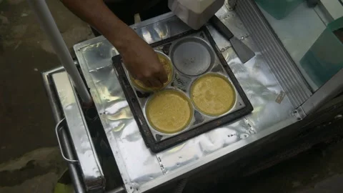 The process of making Martabak mini (Terang Bulan), a typical Indonesian street Stock Footage 301151304