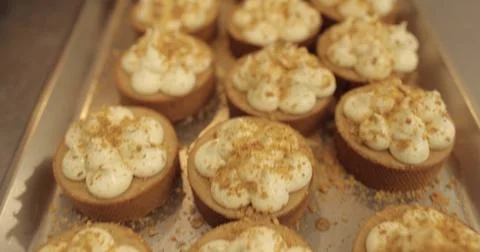 The process of making mini tarts. Sprinkle and decorate mini tarts with gra.. Stock Photos