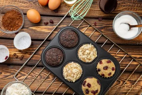 The process of making muffins in bright silicone forms. Cooking process. Prep Stock Photos