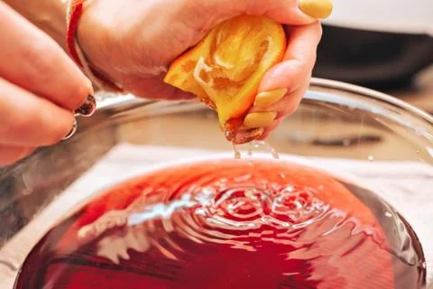 The process of making mulled wine at home in the kitchen. example of how a ho Stock Photos