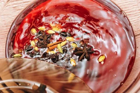 The process of making mulled wine at home in the kitchen. example of how a ho Stock Photos