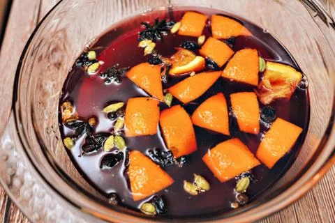 The process of making mulled wine at home in the kitchen. example of how a ho Stock Photos