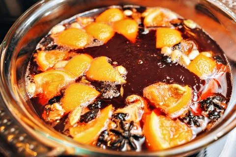 The process of making mulled wine at home in the kitchen. example of how a ho Stock Photos