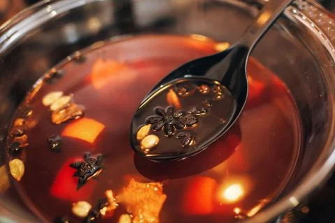 The process of making mulled wine at home in the kitchen. example of how a ho Stock Photos