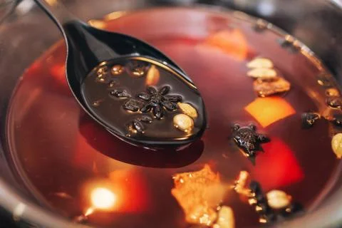 The process of making mulled wine at home in the kitchen. example of how a ho Stock Photos