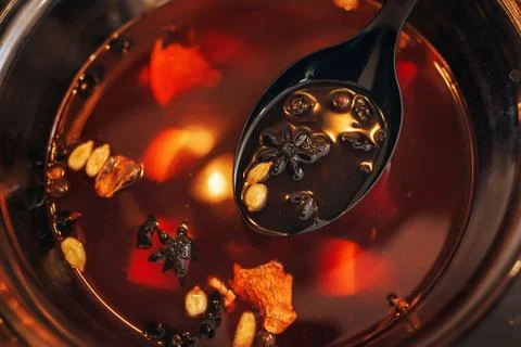 The process of making mulled wine at home in the kitchen. example of how a ho Stock Photos