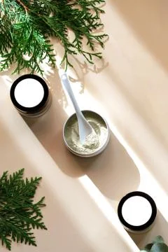 Process of making natural cosmetics from green clay. Stock Photos