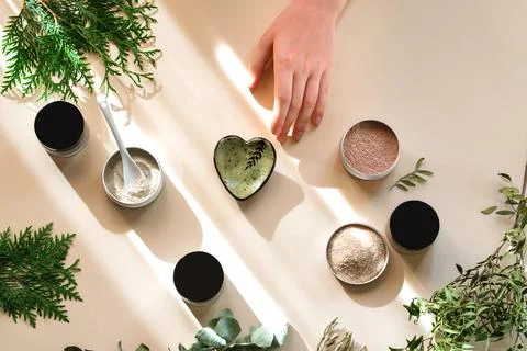 Process of making natural cosmetics from green clay. Stock Photos