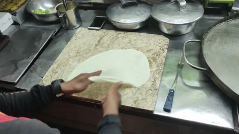 The process of making or cooking an Martabak Telur Stock-Footage 218168526