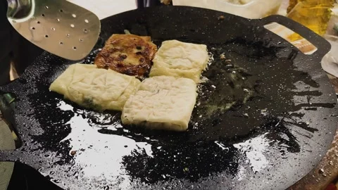 Process of making or cooking martabak eggs, Indonesian street food. Stock Footage 297965189
