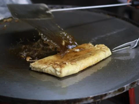 The process of making or cooking an Martabak Telur Stock Photos