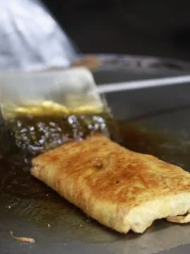 The process of making or cooking an Martabak Telur Stock Photos