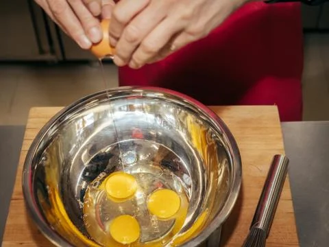 The process of making pancakes. Cook in the kitchen makes the dough 스톡 사진