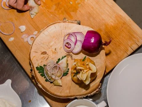 The process of making pancakes. Cook in the kitchen makes the dough. Stock-Fotos