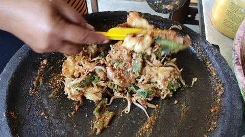 The process of making pecel typical of Java, Stock Footage 112765742