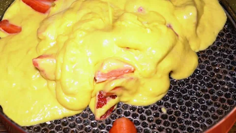 The process of making a pie with strawberries, poured into a baking dish Stock Footage 249444102