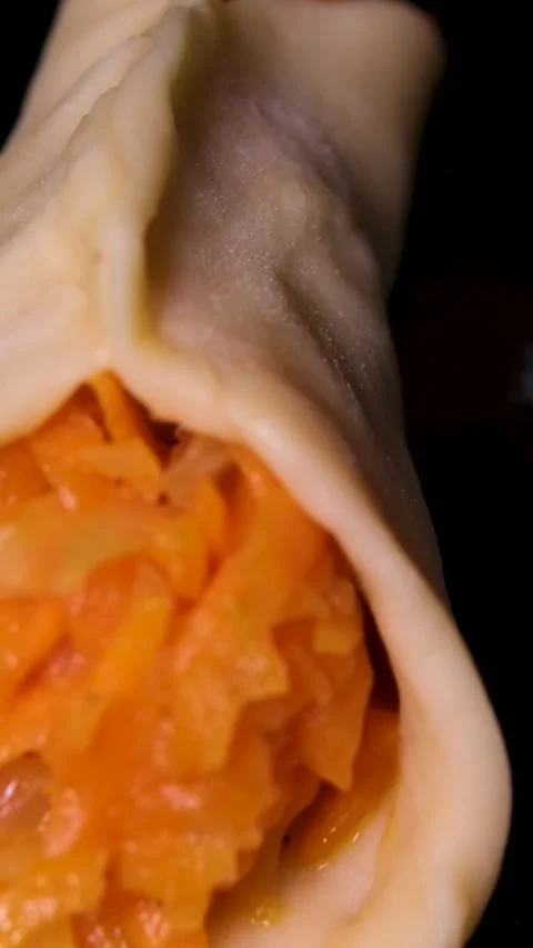 The process of making pies with cabbage, pumpkin and carrots Video stock 305983123