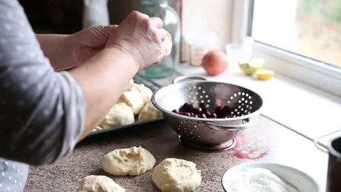 The process of making pies with cherries Stock Footage 83454785