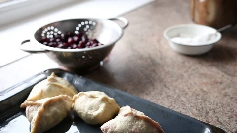 The process of making pies with cherries. Stock Footage 83456129