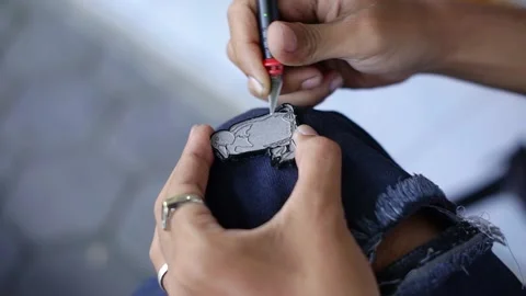The process of making pin crafts made of acrylic and colored using enamel paint Stock Footage