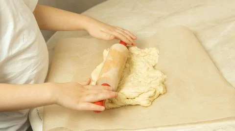 The process of making pizza dough by a child Stock Photos