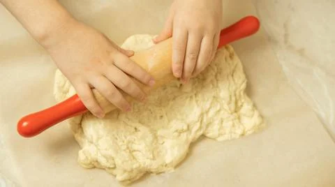 The process of making pizza dough by a child Stock Photos