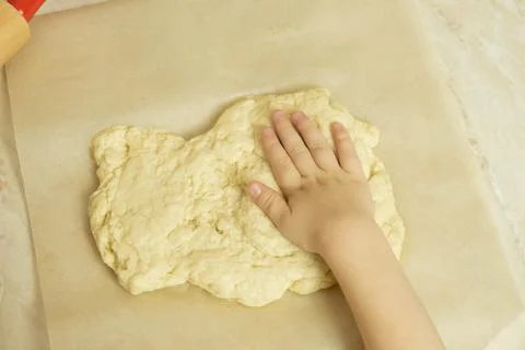 The process of making pizza dough by a child Stock Photos