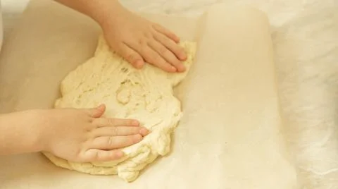 The process of making pizza dough by a child Stock Photos