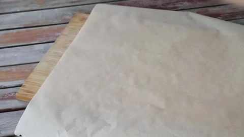 The process of making pizza at table . Fresh dough on kitchen table. Stock Footage 142524093