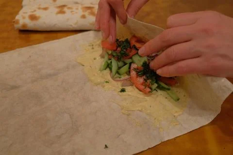 The process of making pizza is visible the product of the human hand Stock Photos