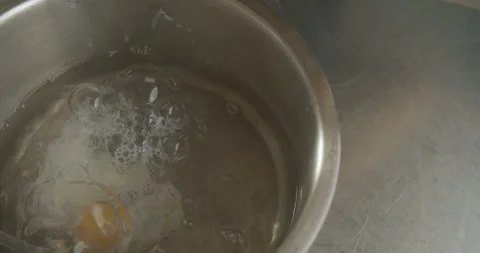 Process of Making Poached Eggs. 4K slow motion video Stock Footage 103526932