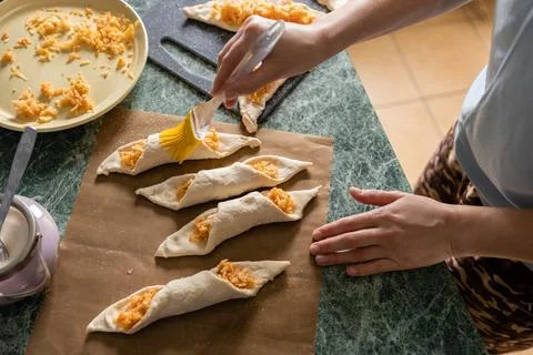 The process of making puff pastry pie. The first culinary experience. Anoint  Stock Photos