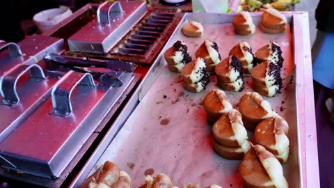 The process of making pukis cake or pancong cake, a traditional cake Stock Footage 339274757