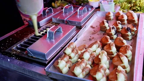 The process of making pukis cake or pancong cake, a traditional cake Stock Footage 339274759