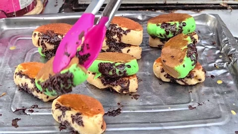The process of making pukis cake or pancong cake, a traditional cake Stock Footage 339274906