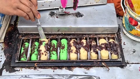 The process of making pukis cake or pancong cake, a traditional cake Stock Footage 339274945